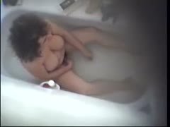 Voyeur masturbating in baths and exposes her big appetizing mambos